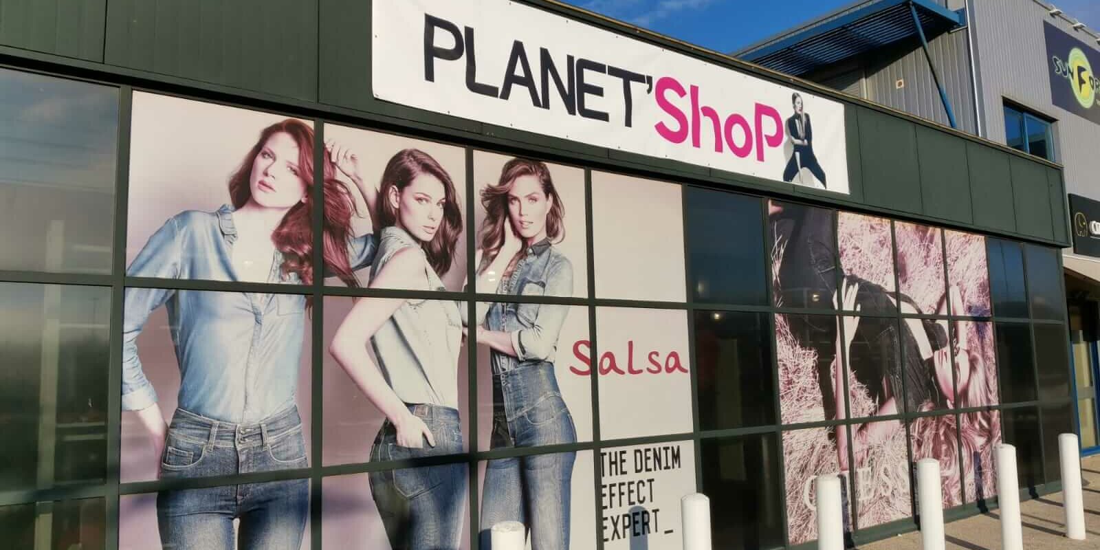 vitrophanie planet shop